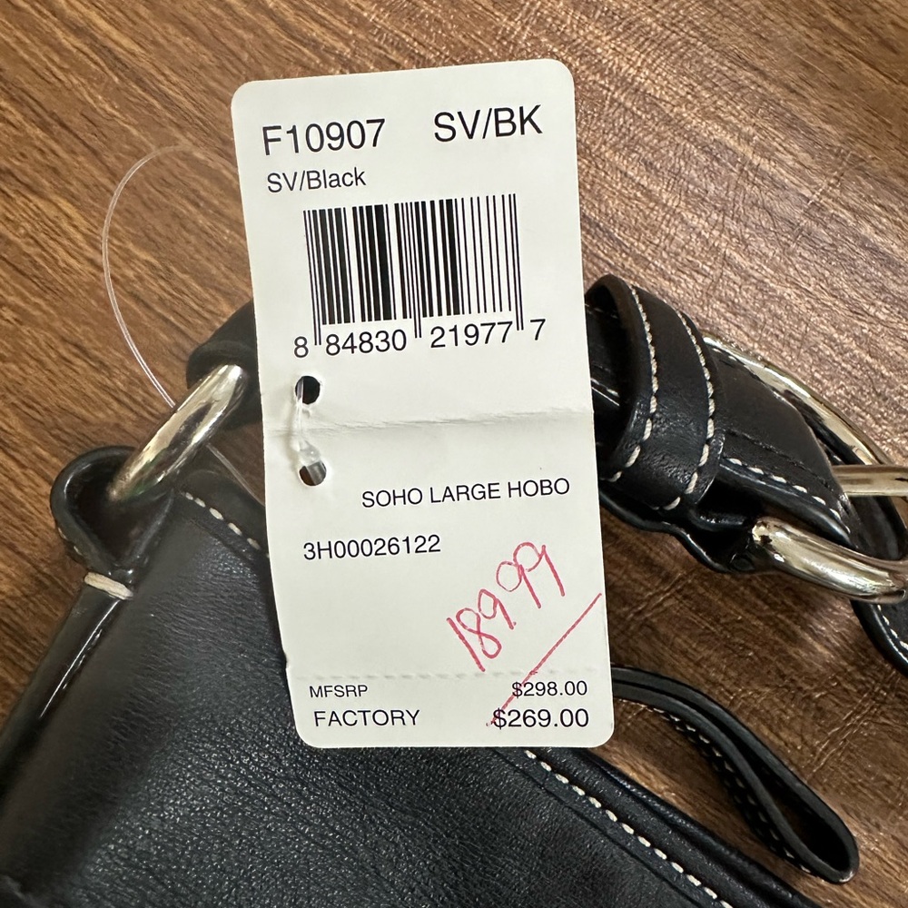 Brand new.  Never used.  Coach bag